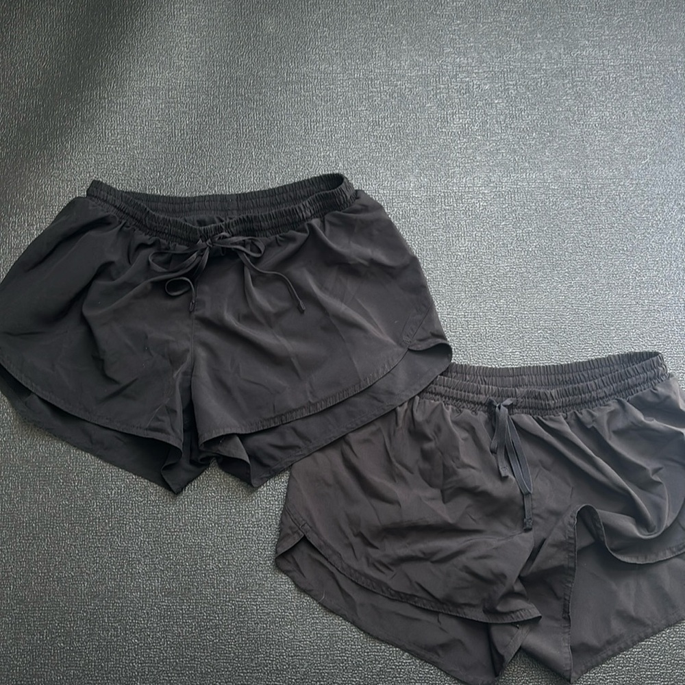 2 pairs of black athletic shorts